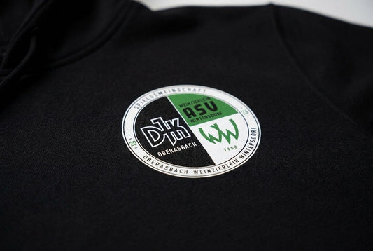 Schwarz, Weiß, Grün: Das Wappen der Spielgemeinschaft erklärt